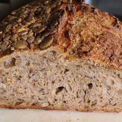 Honest Weight Food Co-op - Anicca Bakery 3 Seed Sourdough crumb. Tasty.