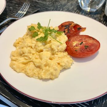 Indigo Restaurant - Scrambled eggs with potato side - Modern European Near Me - London, XGL Indigo Restaurant - Scrambled eggs with potato side - Modern European Near Me - London, XGL