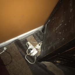 Accumulated dust and total lack of vacuuming in a massage room. Accumulated dust and total lack of vacuuming in a massage room.