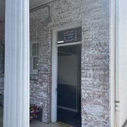 Darien Barber Shop - Back entrance of Darien Barber Shop.