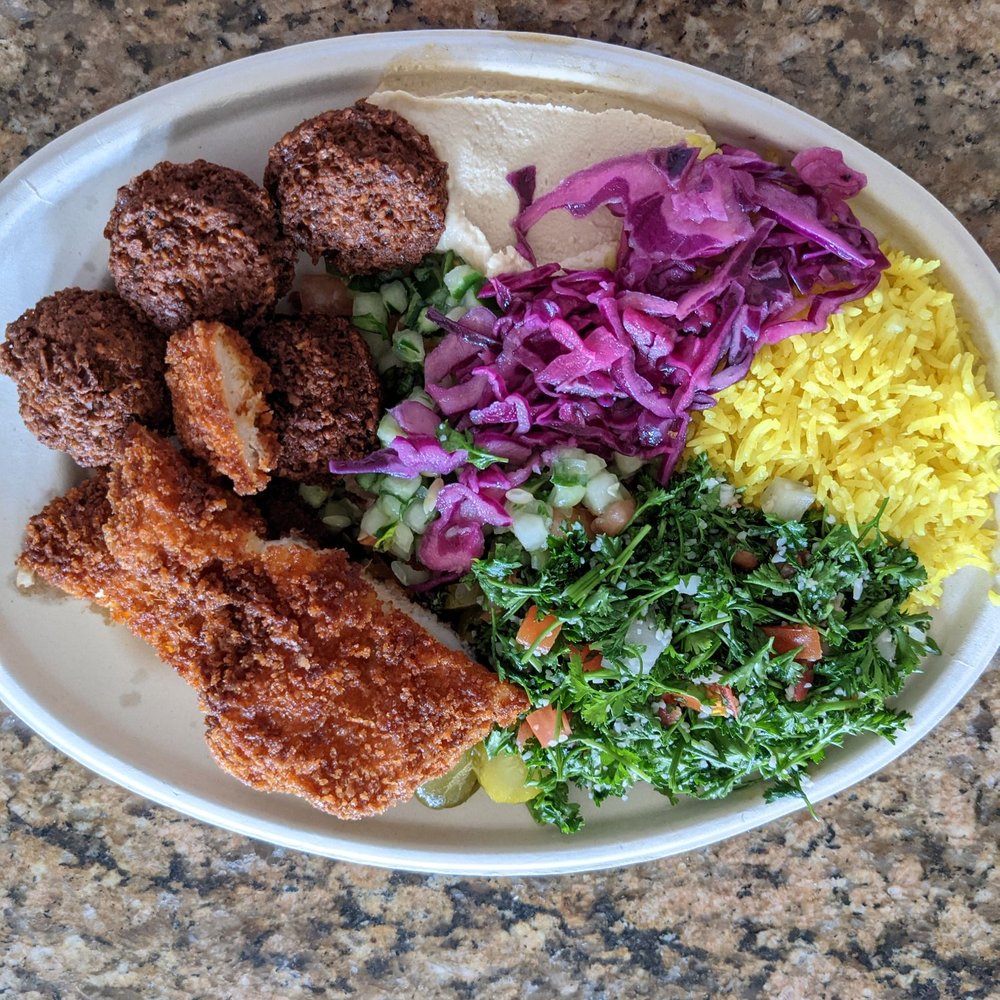 Pick 2 plate with falafel and chicken schnitzel. $11.50 before tax. Also comes with pita bread (not pictured). Pick 2 plate with falafel and chicken schnitzel. $11.50 before tax. Also comes with pita bread (not pictured).