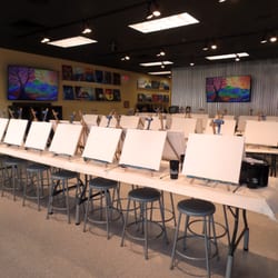 Painting with a Twist - This is the main studio room - notice the big-screen TVs