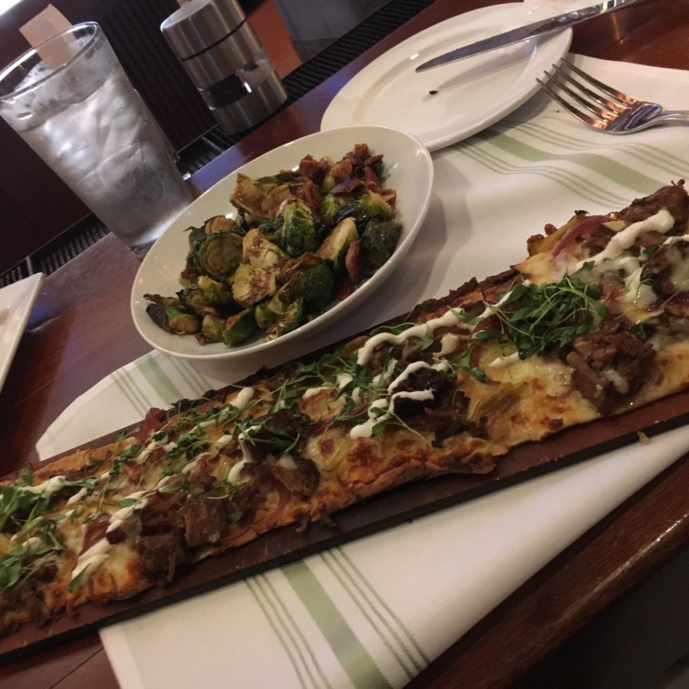 Seasons 52 - Short rib flatbread and side of Brussels - New American Near Me - Schaumburg, Illinois Seasons 52 - Short rib flatbread and side of Brussels - New American Near Me - Schaumburg, Illinois