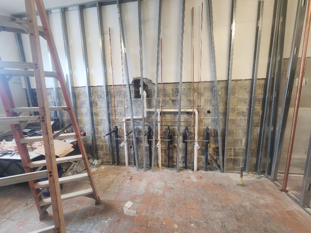 Slide of REM Plumbing & Heating