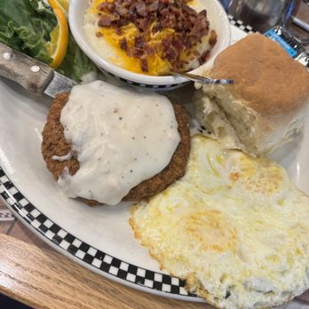 Black Bear Diner Olathe - Chicken Fried Steak (560 cals) with 1 Biscuit & Country Gravy (680 cals./760 cals.) and Loaded Creamy Grits (200 cals.) - Diners Near Me - Olathe, Kansas Black Bear Diner Olathe - Chicken Fried Steak (560 cals) with 1 Biscuit & Country Gravy (680 cals./760 cals.) and Loaded Creamy Grits (200 cals.) - Diners Near Me - Olathe, Kansas
