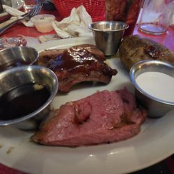 Haines Steak House - Beef sampler: small portions of brisket, prime rib, ribs and baked potato.