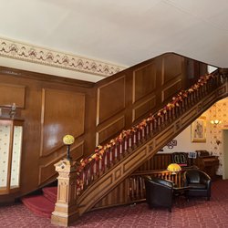 Decker Hotel & Restaurant - The grand staircase up to the rooms. There is also an elevator for accessibility.