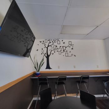 Bubble Tea Fresh Fruit Juice - a tv mounted on the wall - Bubble Tea Near Me - Seattle, Washington