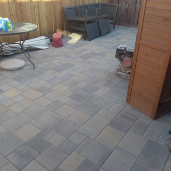 Ignacio's Tree Service - a patio with a table and chairs - Lawn Services Near Me