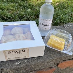La Farm Bakery - White chocolate baguettes, lemon square, and water