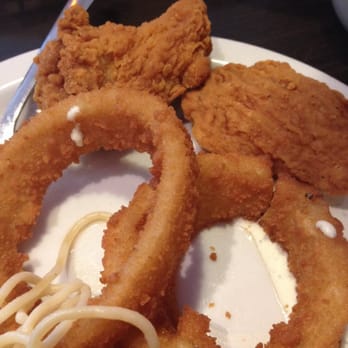 Sizzler - Onion rings and chicken strips at the salad bar - Steakhouses Near Me - Montebello, California Sizzler - Onion rings and chicken strips at the salad bar - Steakhouses Near Me - Montebello, California