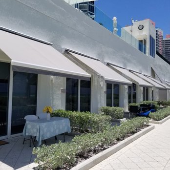 Specialty Awning - Retractables awnings using Sunbrella Fire Resistant fabric - Awnings Near Me
