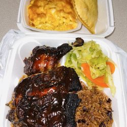 Top Taste Grill - Jerk Chicken, Rice And Peas, Cabbage, Mac&Cheese and Chicken Patty.