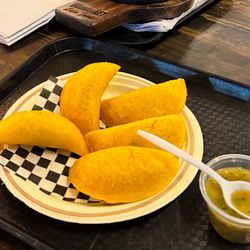 UniMarket - Beef Empanadas, Frijolada con chicharron in the back