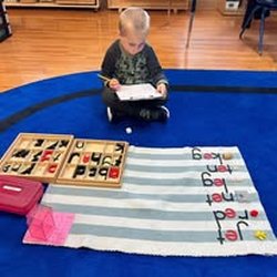 Learning to spell isolating the "e" in three letter words.