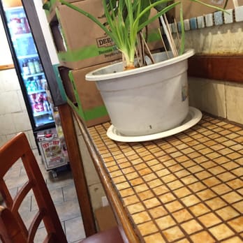 Mila Cafe - There's an onion growing out of that pot - Breakfast & Brunch Near Me - New York, New York Mila Cafe - There's an onion growing out of that pot - Breakfast & Brunch Near Me - New York, New York