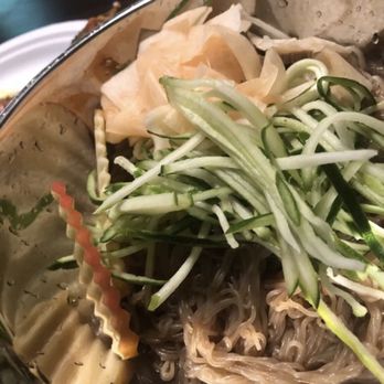 Yoree Korean Cuisine - Daikon apple cucumber and acorn noodles before the icy broth. Yummy - Korean Near Me - Austin, Texas Yoree Korean Cuisine - Daikon apple cucumber and acorn noodles before the icy broth. Yummy - Korean Near Me - Austin, Texas
