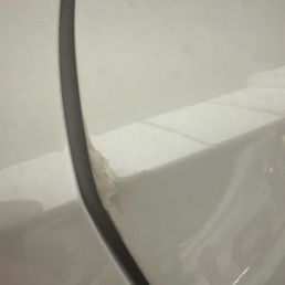 The chip on my door after they repainted it back after chipping it. The chip on my door after they repainted it back after chipping it.