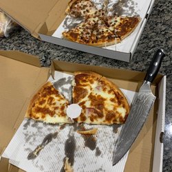 Dj's Lounge & Pizzeria - Pizza ordered. Pepperoni and a meat pizza
