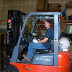Brian using the forklift