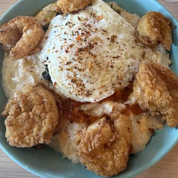The Wafflery - Fried shrimp bowl with grits, greens and an egg - Comfort Food Near Me - Charlotte, North Carolina The Wafflery - Fried shrimp bowl with grits, greens and an egg - Comfort Food Near Me - Charlotte, North Carolina