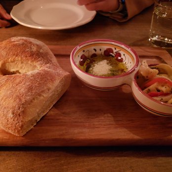 Ciccio Mio - Table fresh warm bread with pickled vegetables and slices of salami. - Italian Near Me - Chicago, Illinois