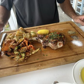 Blu Kouzina - Pork chop - Greek Near Me - Sarasota, Florida Blu Kouzina - Pork chop - Greek Near Me - Sarasota, Florida