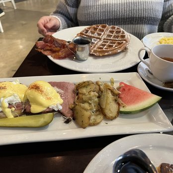 Eggspectation - Bay Street - Montreal egg Benedict with they potatoes and waffle - Breakfast & Brunch Near Me - Toronto, Ontario Eggspectation - Bay Street - Montreal egg Benedict with they potatoes and waffle - Breakfast & Brunch Near Me - Toronto, Ontario