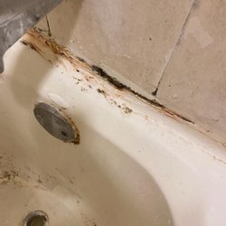 Janko Property Management - Mold around the tub.