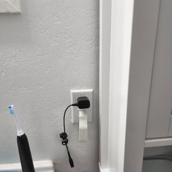Scapin Electric - New outlet they installed. No outlet in the bathroom previously,