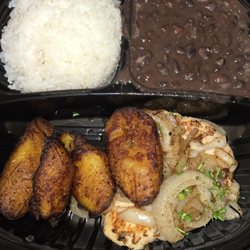 White rice, black beans, grilled chicken, fried plantain.