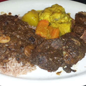 Sweet Spice - Curry chicken, jerk chicken and oxtail along with rice and peas (and roti which is not pictured) - Caribbean Near Me - Savannah, Georgia Sweet Spice - Curry chicken, jerk chicken and oxtail along with rice and peas (and roti which is not pictured) - Caribbean Near Me - Savannah, Georgia