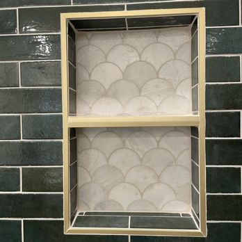 Zavala Builds - a window in a tiled wall - General Contractors Near Me Zavala Builds - a window in a tiled wall - General Contractors Near Me