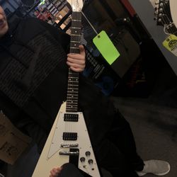 Motor City Guitar - a 1967 Epiphone Flying V that was being sold at motor city guitar