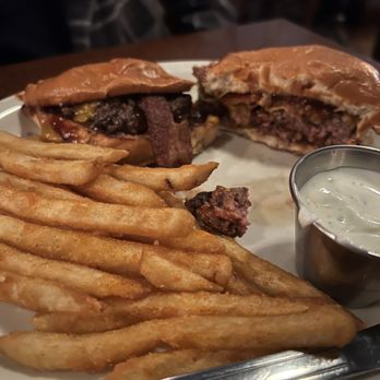 Killarney's Irish Pub & Grill - Bacon blue cheese burger, sans onions and already dug into - Pubs Near Me - Temecula, California
