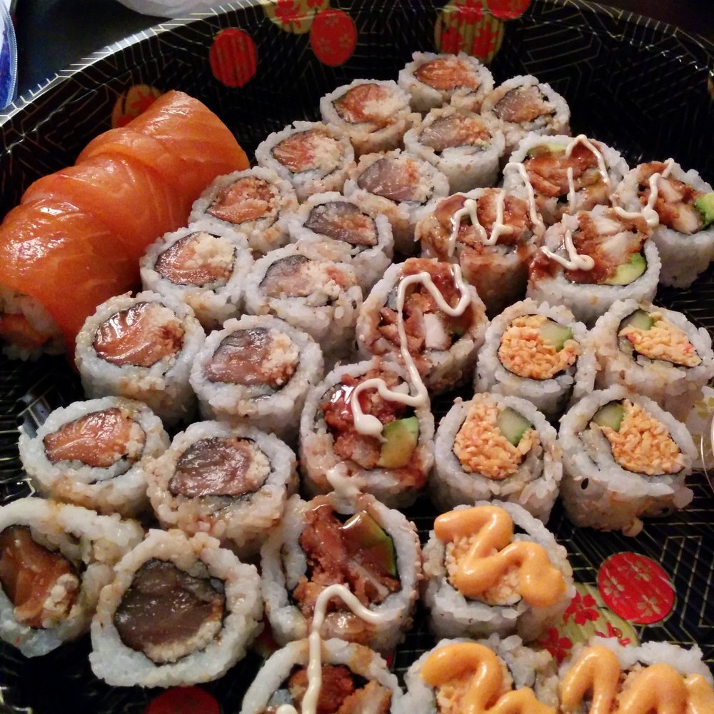 Red dragon roll, spicy salmon, spicy white tuna roll, crispy chicken roll, and spicy crab roll. Red dragon roll, spicy salmon, spicy white tuna roll, crispy chicken roll, and spicy crab roll.