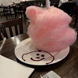 In house cotton candy, freshly made and brought to your table when your server brings the check.