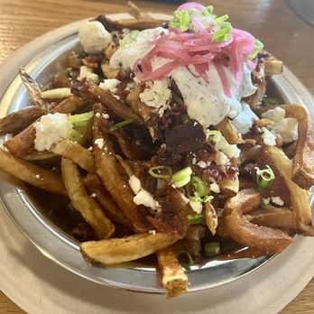 The Garage - Loaded fries with feta bacon scallions tzatziki - Food Trucks Near Me - Frederick, Maryland
