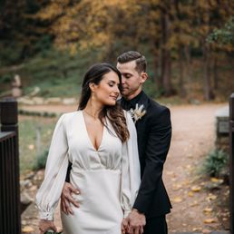 She made the sleeves slimmer, added cuffs that weren't there before, took in the entire dress and plunging neckline, and hemmed the bottom