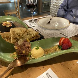 La Bahía - The tuna tartare - complete with sorbet, fruit, and crushed pistachios.