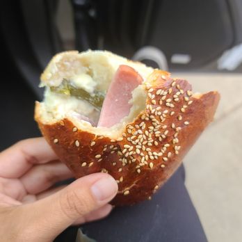 Don Felipes Panaderia - a person holding a sandwich - Bakeries Near Me - Vista, California Don Felipes Panaderia - a person holding a sandwich - Bakeries Near Me - Vista, California
