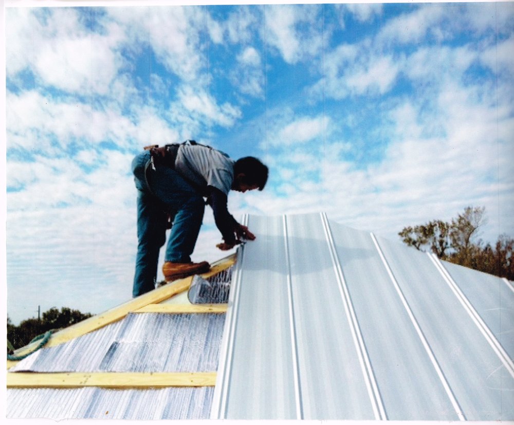 Slide of T Mark Roofing