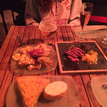 Lateral - Duck, artichoke, and Spanish tortilla. - Tapas Bars Near Me - Madrid, M Lateral - Duck, artichoke, and Spanish tortilla. - Tapas Bars Near Me - Madrid, M