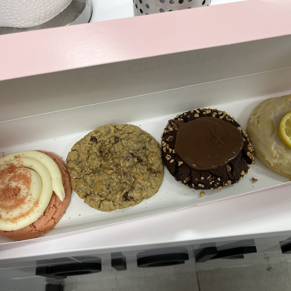 Crumbl - Fredericksburg - Left to right: Pink velvet, Moms recipe, Nutella hazelnut, lemon glaze. - Bakeries Near Me - Fredericksburg, Virginia Crumbl - Fredericksburg - Left to right: Pink velvet, Moms recipe, Nutella hazelnut, lemon glaze. - Bakeries Near Me - Fredericksburg, Virginia