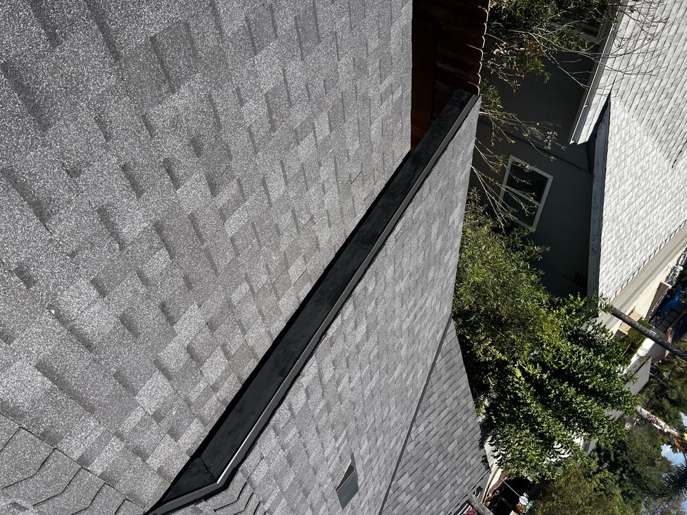 Slide of Kayhan's Roofing