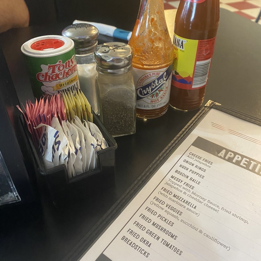 Dempsey's Poboys - Just a normal Cajun restaurant table LOL - Seafood Near Me - Baton Rouge, Louisiana