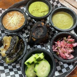 Rib eye, bone marrow, taco de birria, tortillas de harina