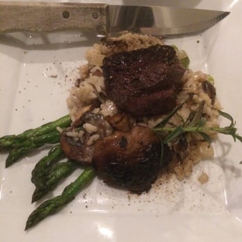 Gigi's Southern Table - Petite filet on a bed of asparagus and mushroom risotto - New American Near Me - State College, Pennsylvania Gigi's Southern Table - Petite filet on a bed of asparagus and mushroom risotto - New American Near Me - State College, Pennsylvania