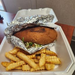 Closed carne asada torta with fries. The fries were the BEST thing in plate . Closed carne asada torta with fries. The fries were the BEST thing in plate .
