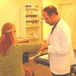Dr Thompson Working on a elbow using active release.